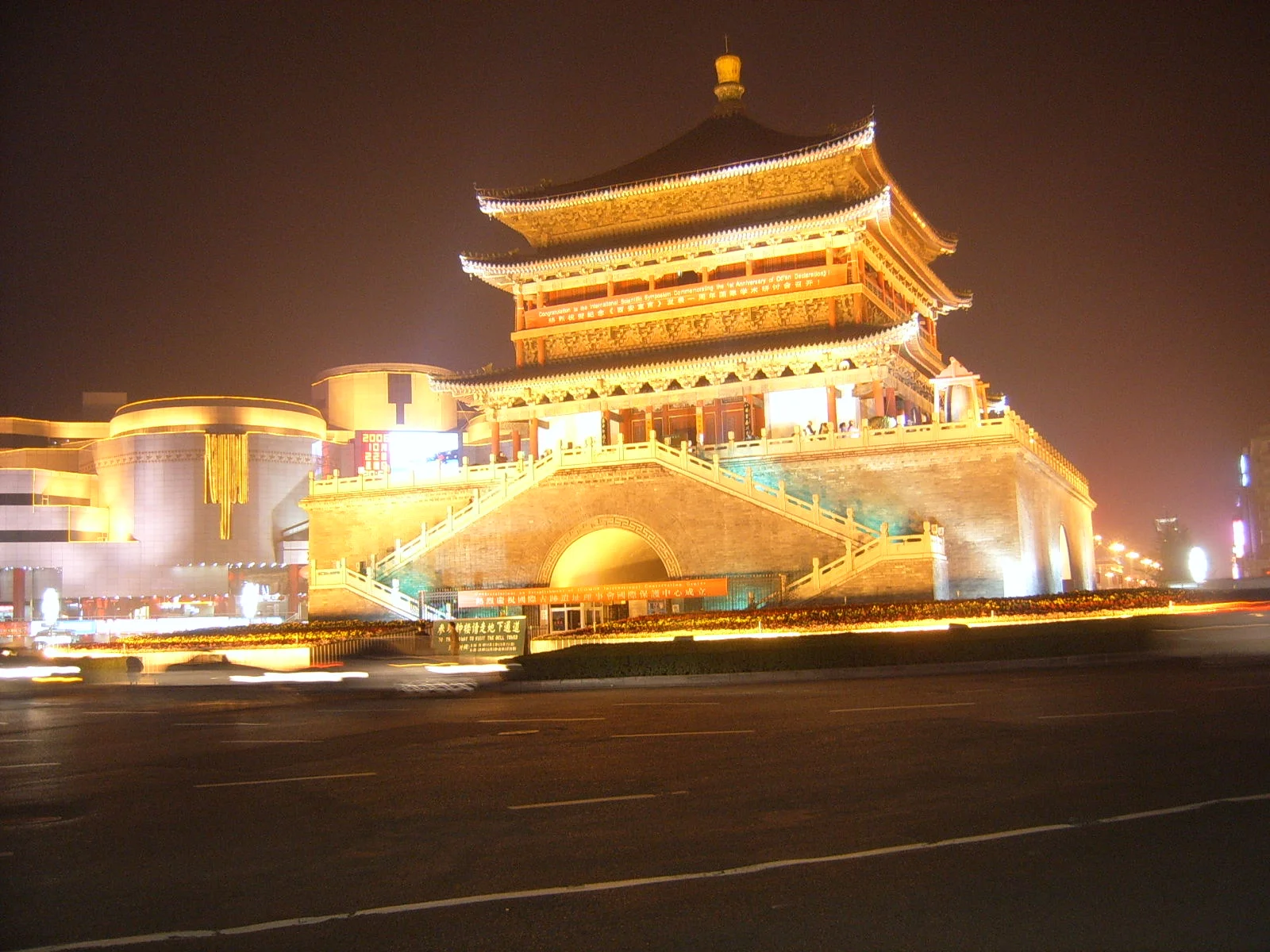 Xi’an Bell Tower illuminated in golden light after dark