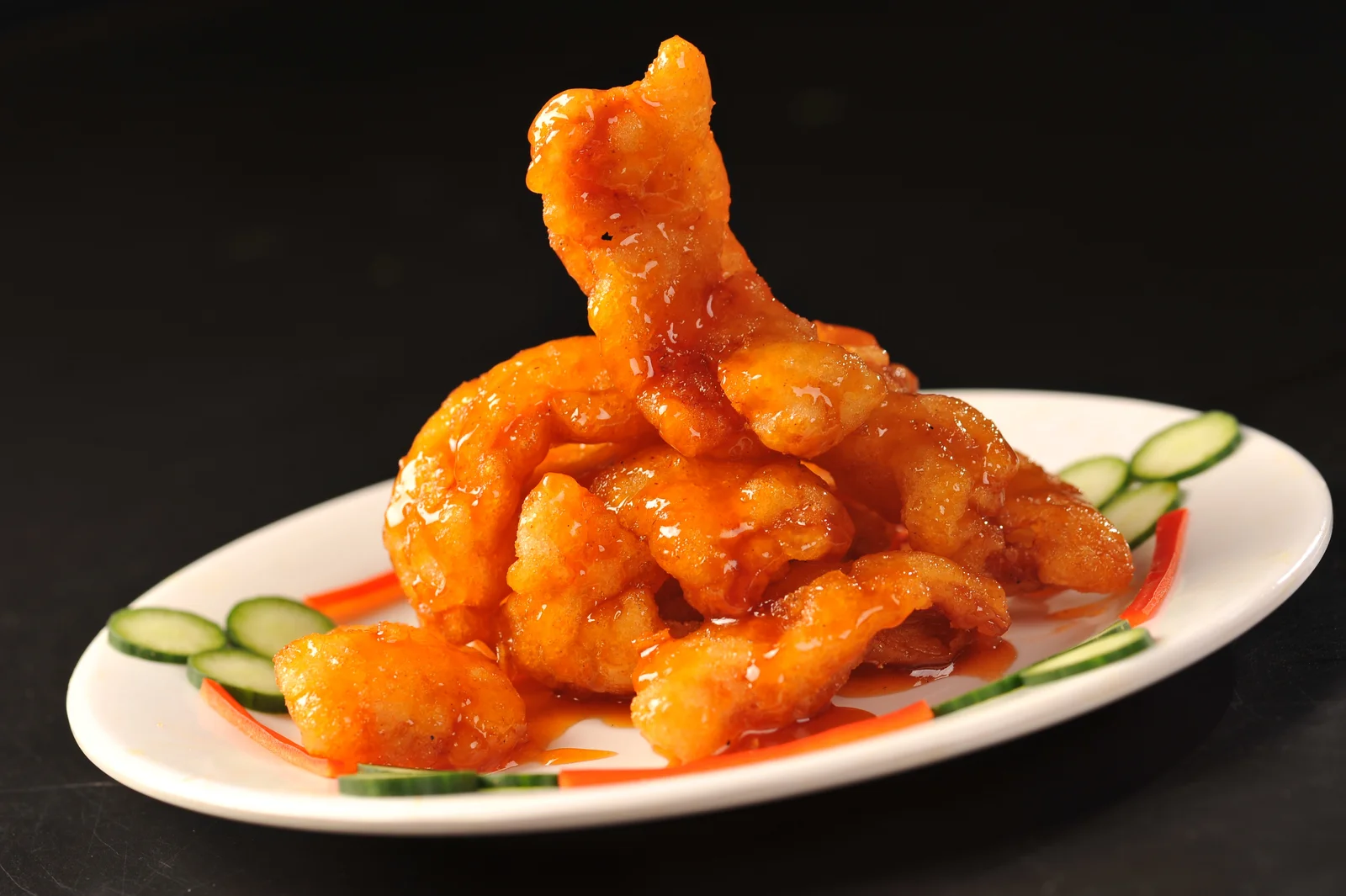 Golden fried guo bao rou in a glossy sweet and sour coating